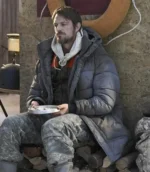 Joel Kinnaman Ice Fall 2025 grey puffer jacket