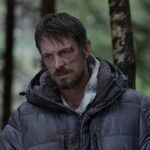 Joel Kinnaman Ice Fall 2025 grey hooded puffer jacket
