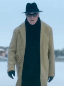 Danny Huston Ice Fall 2025 warm camel coat
