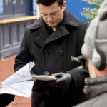 Wes Brown A Newport Christmas 2025 black wool coat