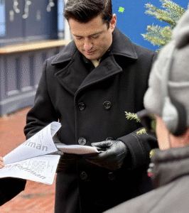 Wes Brown A Newport Christmas 2025 black wool coat