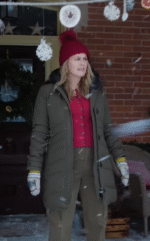 Alicia Silverstone A Merry Little Ex-Mas 2025 green puffer jacket