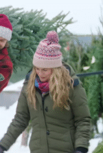 Alicia Silverstone A Merry Little Ex-Mas 2025 casual green puffer jacket