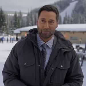 Ryan Eggold My Secret Santa 2025 gray hooded parachute puffer jacket
