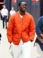 Damson Idris Formula 1 Movie orange parachute jacket