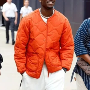 Damson Idris Formula 1 Movie orange parachute jacket